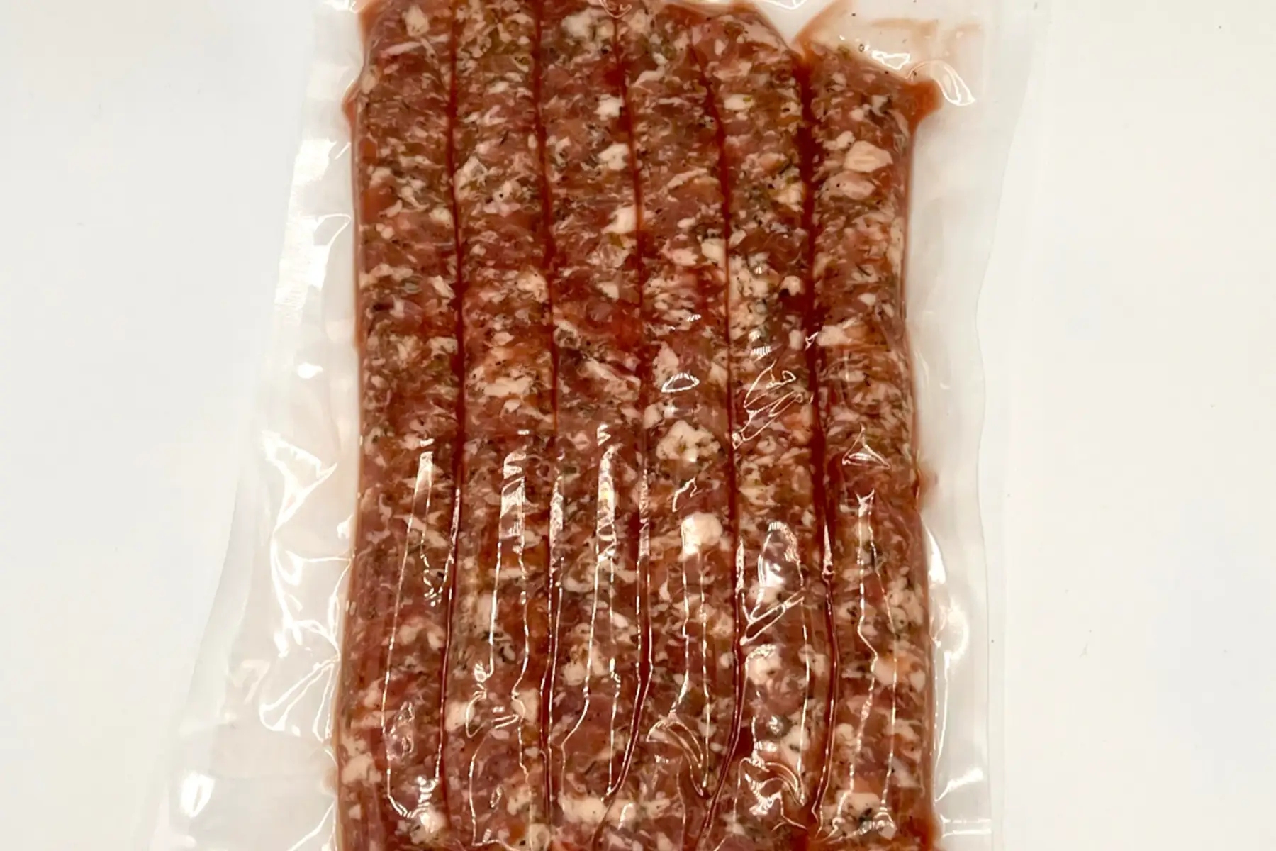saucisse aux herbes - 13,75€/kg - environ 500g